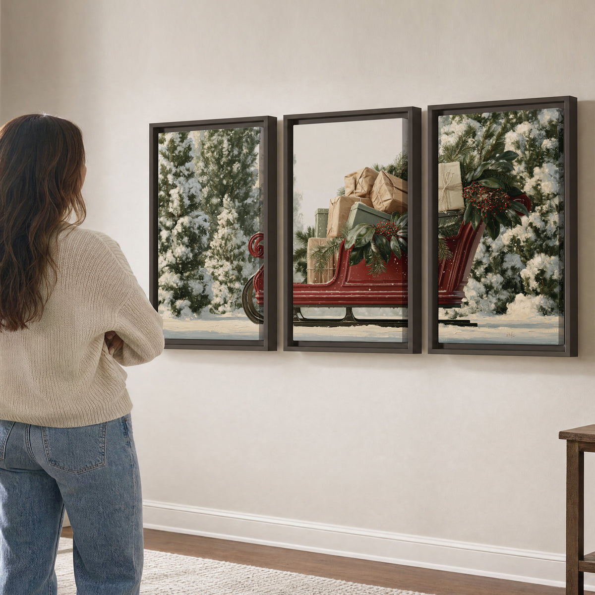 A red sleigh filled with wrapped gifts and evergreen branches among snowy fir trees 3 piece framed canvas wall art three panel arrangement on a wall