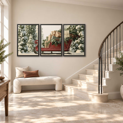 A red sleigh filled with wrapped gifts and evergreen branches among snowy fir trees 3 piece framed canvas wall art styled in an interior