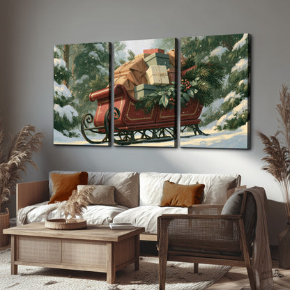 A red sleigh stacked with warm neutral gifts beneath snow-covered evergreen branches 3 piece canvas wall art displayed in a rustic living room