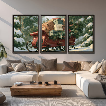 A red sleigh stacked with warm neutral gifts beneath snow-covered evergreen branches 3 piece framed canvas wall art displayed in a living room