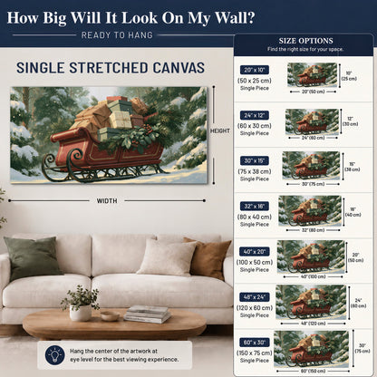 A red sleigh stacked with warm neutral gifts beneath snow-covered evergreen branches single canvas wall art size guide above a sofa; room view is illustrative