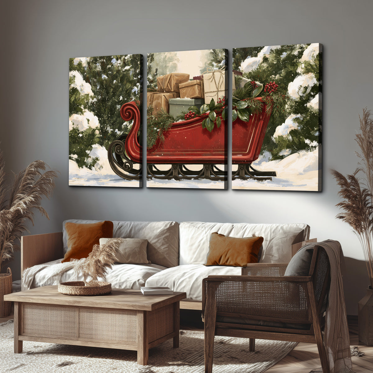 A decorative red holiday sleigh carrying wrapped presents and greenery through a snowy woodland 3 piece canvas wall art displayed in a rustic living room