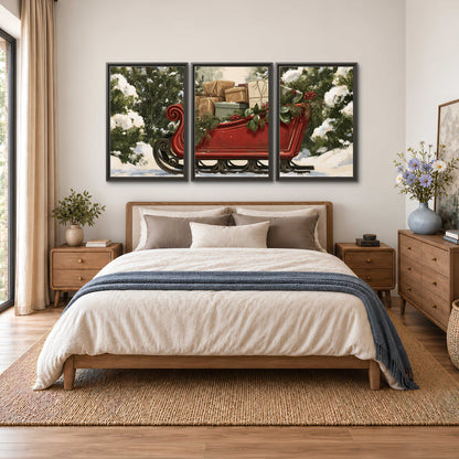 A decorative red holiday sleigh carrying wrapped presents and greenery through a snowy woodland 3 piece framed canvas wall art styled in an interior