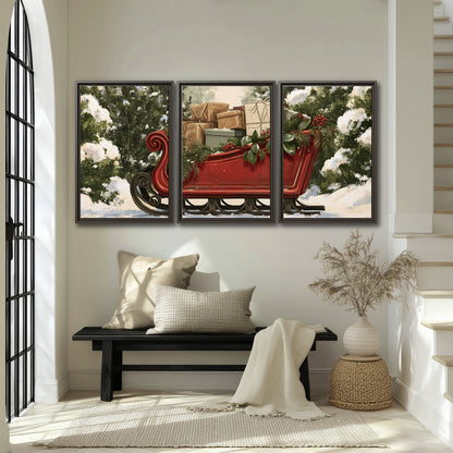 A decorative red holiday sleigh carrying wrapped presents and greenery through a snowy woodland 3 piece framed canvas wall art displayed in a entryway