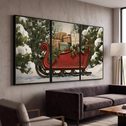 A decorative red holiday sleigh carrying wrapped presents and greenery through a snowy woodland 3 piece framed canvas wall art displayed in a modern living room