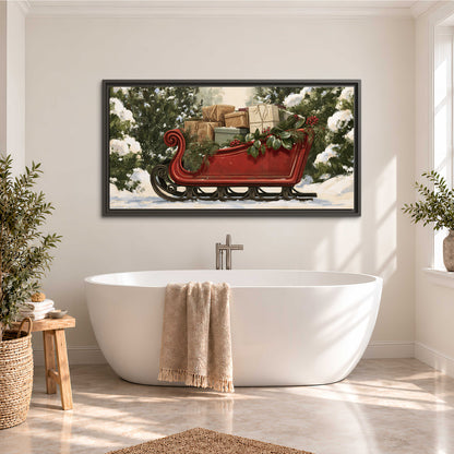 A decorative red holiday sleigh carrying wrapped presents and greenery through a snowy woodland single framed canvas wall art styled in an interior