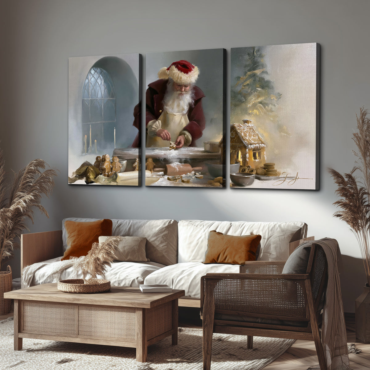 Santa working with dough beside a gingerbread house in a softly lit Christmas kitchen 3 piece canvas wall art displayed in a rustic living room