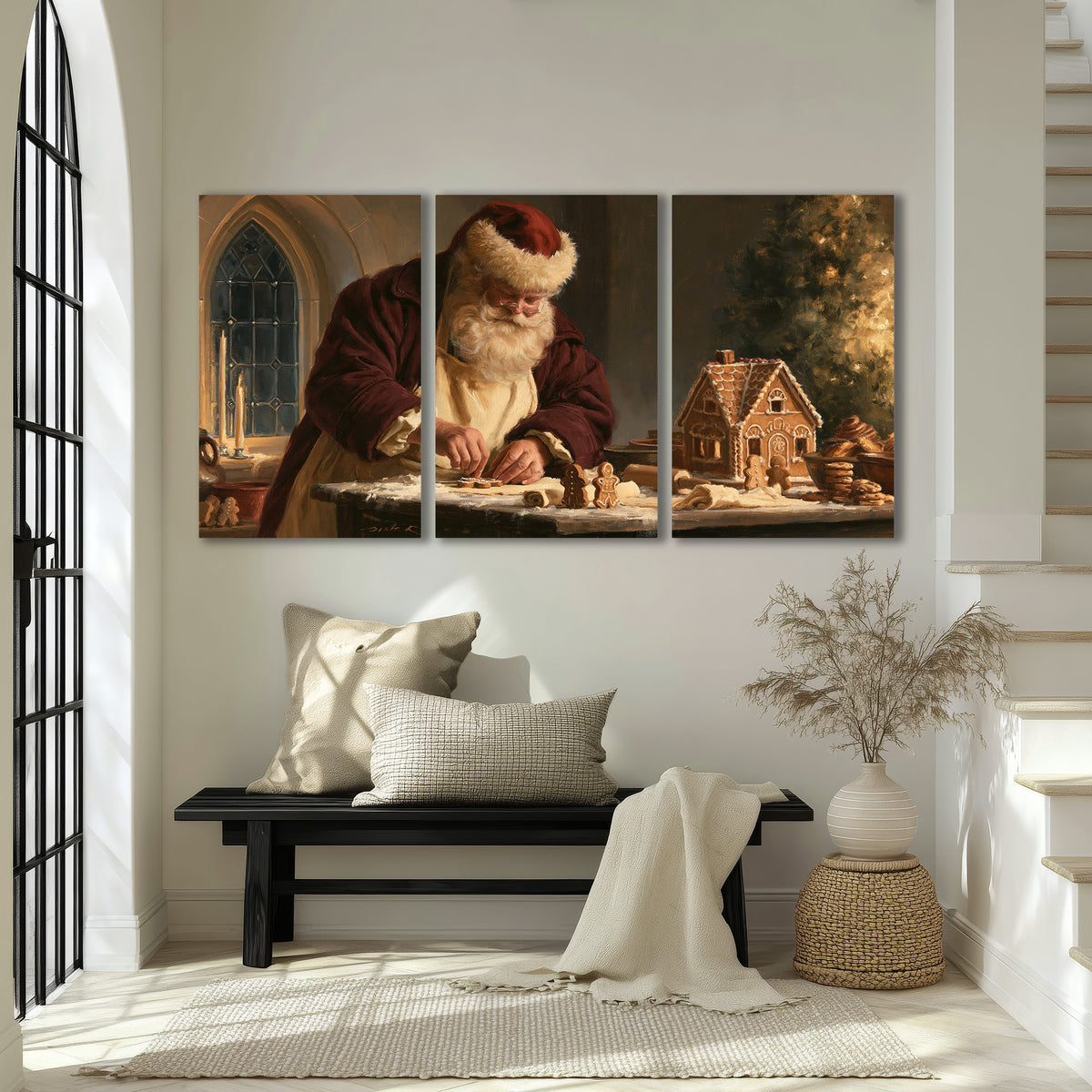 Santa shaping a gingerbread creation at a worktable beside a glowing Christmas tree 3 piece canvas wall art displayed in a entryway
