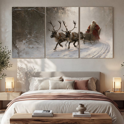 Santa riding a reindeer-drawn sleigh along a winding snowy woodland path 3 piece canvas wall art displayed in a bedroom
