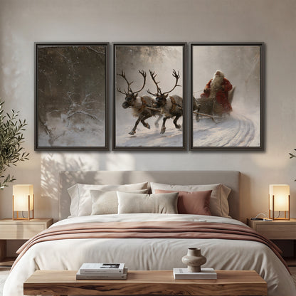 Santa riding a reindeer-drawn sleigh along a winding snowy woodland path 3 piece framed canvas wall art displayed in a bedroom