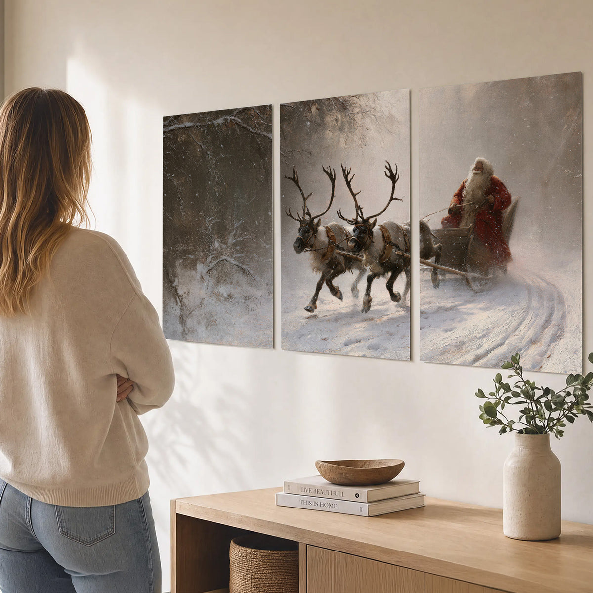Santa riding a reindeer-drawn sleigh along a winding snowy woodland path set of 3 poster prints three panel arrangement on a wall