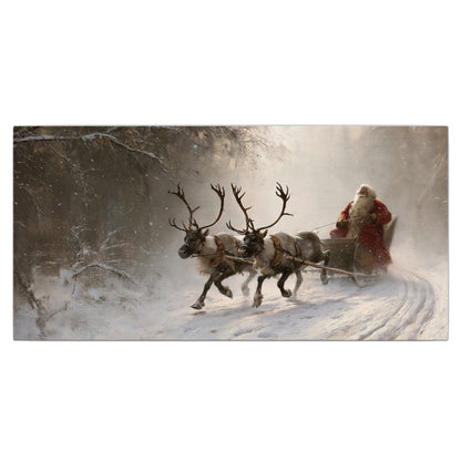 Santa riding a reindeer-drawn sleigh along a winding snowy woodland path single canvas wall art viewed straight on