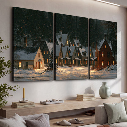 Snow-covered village cottages with glowing windows beneath a dark evergreen forest 3 piece canvas wall art displayed in a console