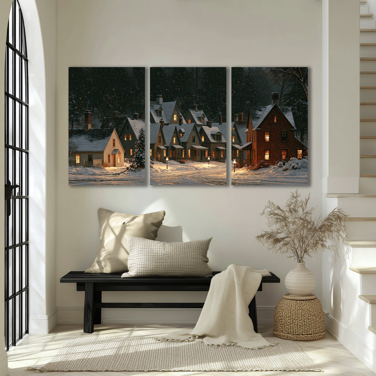 Snow-covered village cottages with glowing windows beneath a dark evergreen forest 3 piece canvas wall art displayed in a entryway