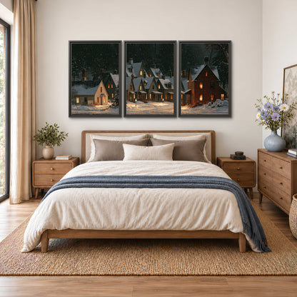 Snow-covered village cottages with glowing windows beneath a dark evergreen forest 3 piece framed canvas wall art styled in an interior