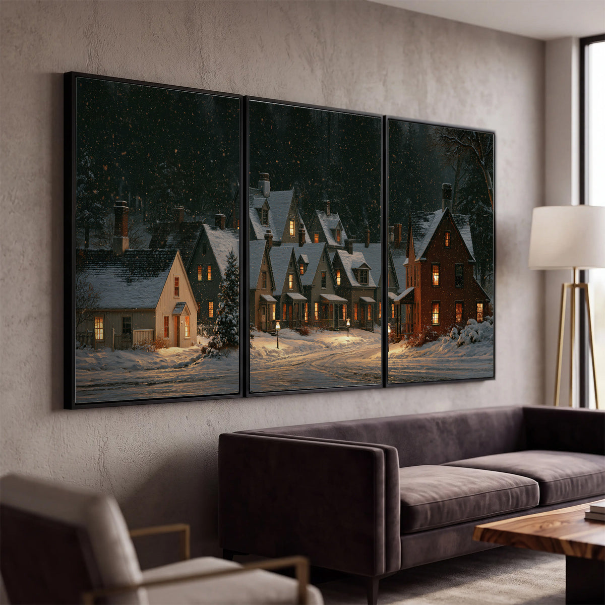 Snow-covered village cottages with glowing windows beneath a dark evergreen forest 3 piece framed canvas wall art displayed in a modern living room