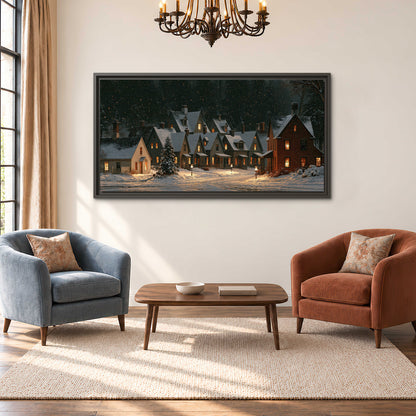 Snow-covered village cottages with glowing windows beneath a dark evergreen forest single framed canvas wall art styled in an interior