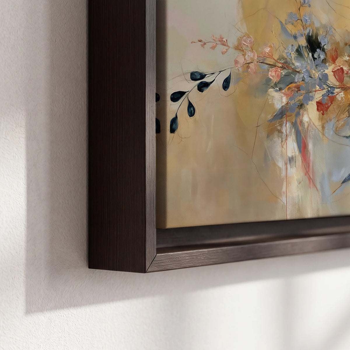 Loose dark blue leaves and pale blossoms on a warm beige painterly background 3 piece framed canvas wall art material and edge close up