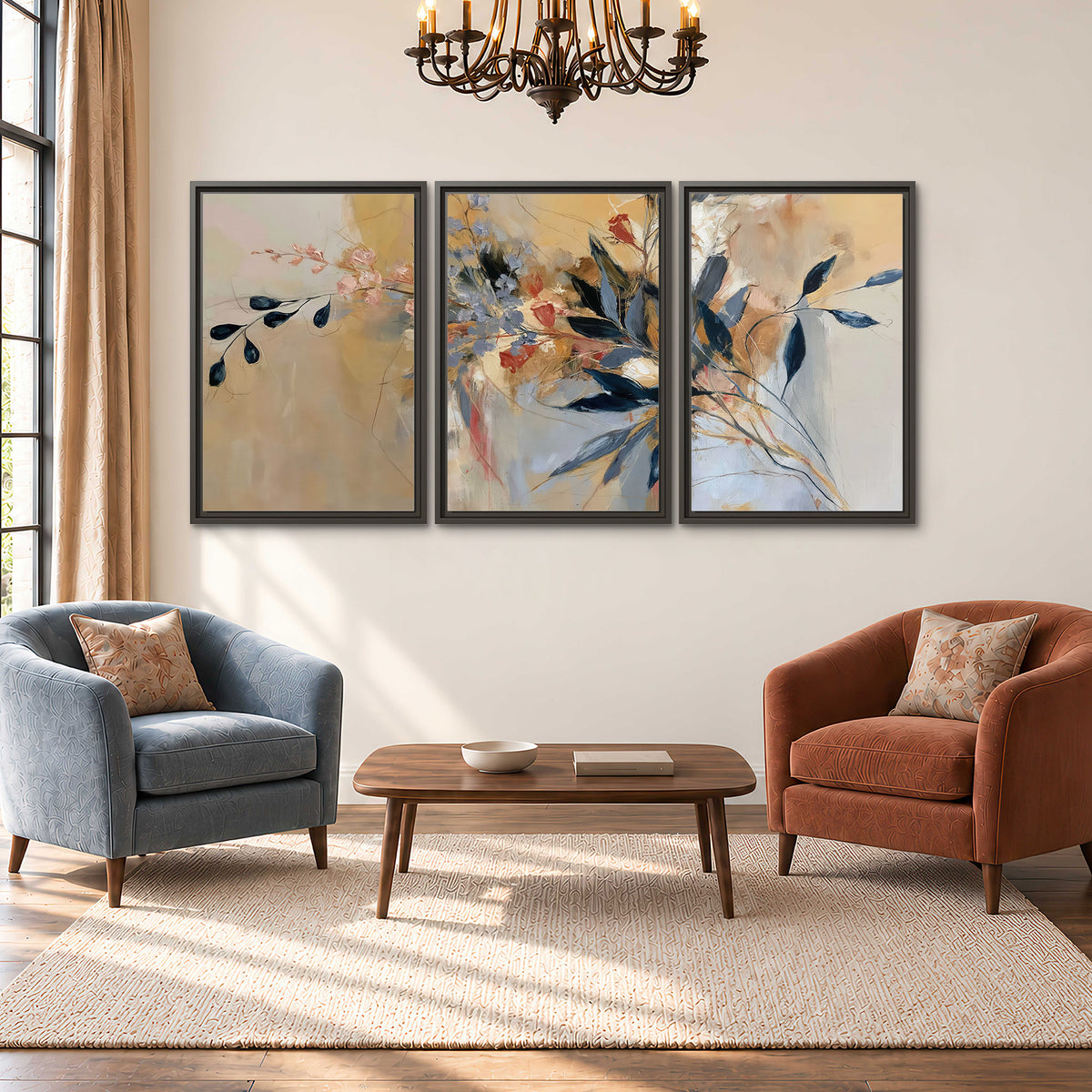 Loose dark blue leaves and pale blossoms on a warm beige painterly background 3 piece framed canvas wall art styled in an interior
