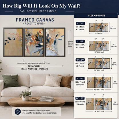 Loose dark blue leaves and pale blossoms on a warm beige painterly background 3 piece framed canvas wall art size guide above a sofa; room view is illustrative