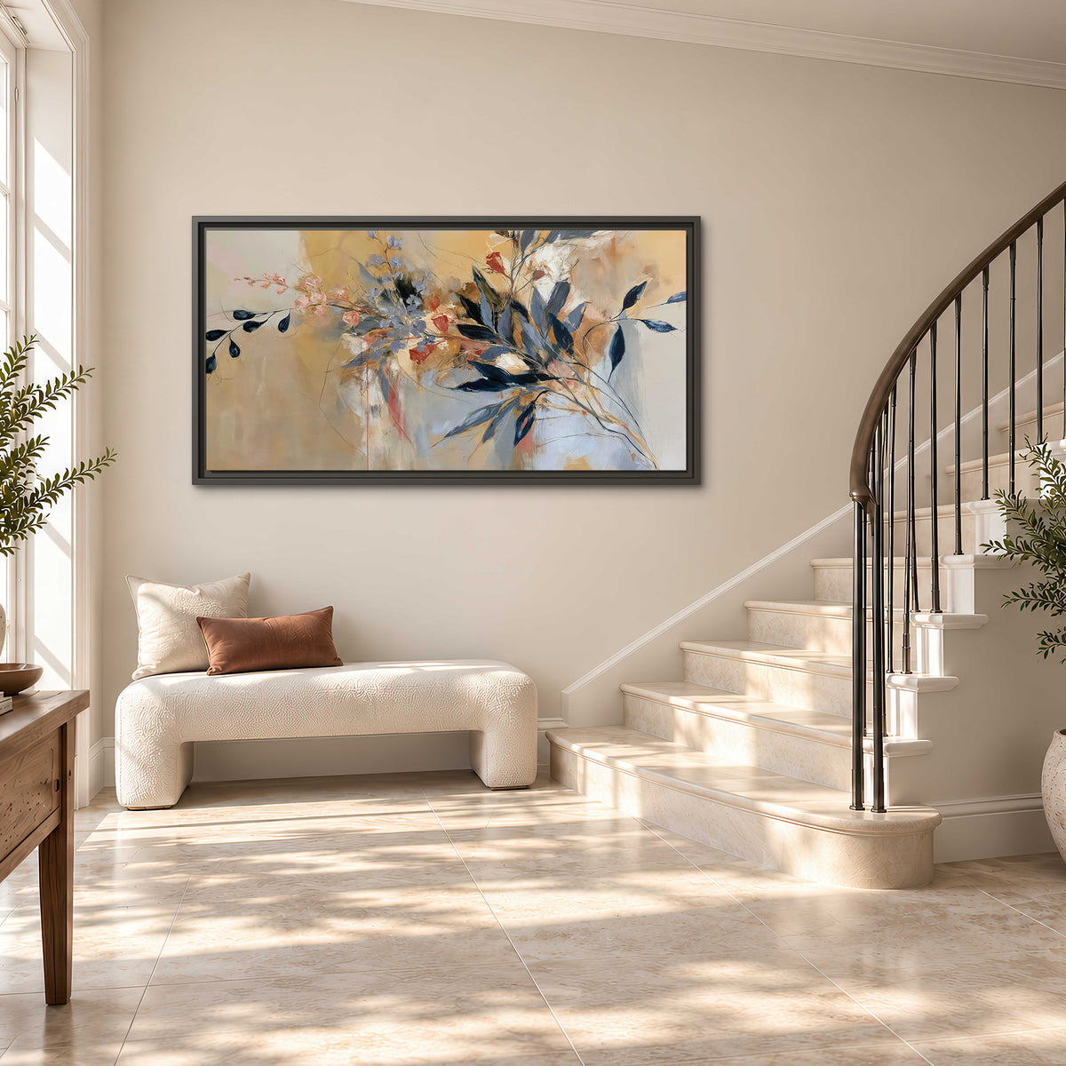 Loose dark blue leaves and pale blossoms on a warm beige painterly background single framed canvas wall art styled in an interior