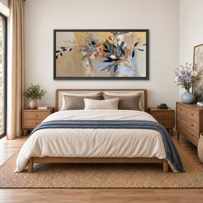 Loose dark blue leaves and pale blossoms on a warm beige painterly background single framed canvas wall art styled in an interior