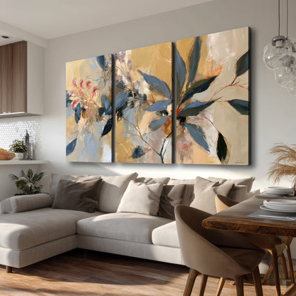 Layered navy leaves and muted pink blossoms against a golden cream background 3 piece canvas wall art room and product view