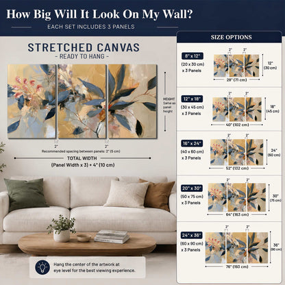 Layered navy leaves and muted pink blossoms against a golden cream background 3 piece canvas wall art size guide above a sofa; room view is illustrative