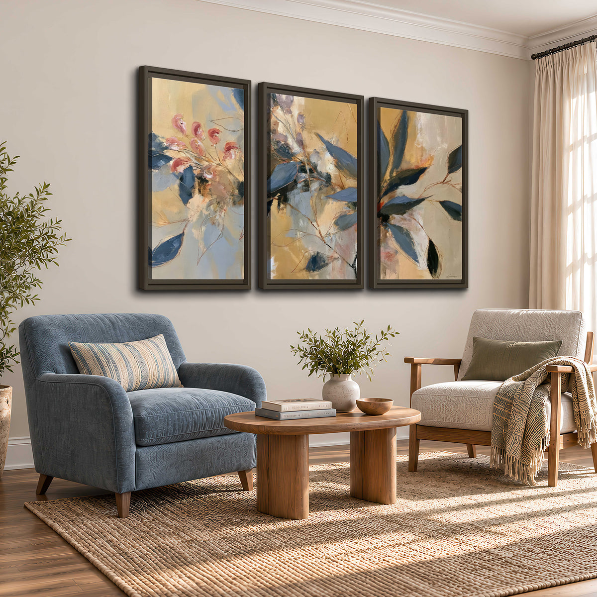 Layered navy leaves and muted pink blossoms against a golden cream background 3 piece framed canvas wall art styled in an interior