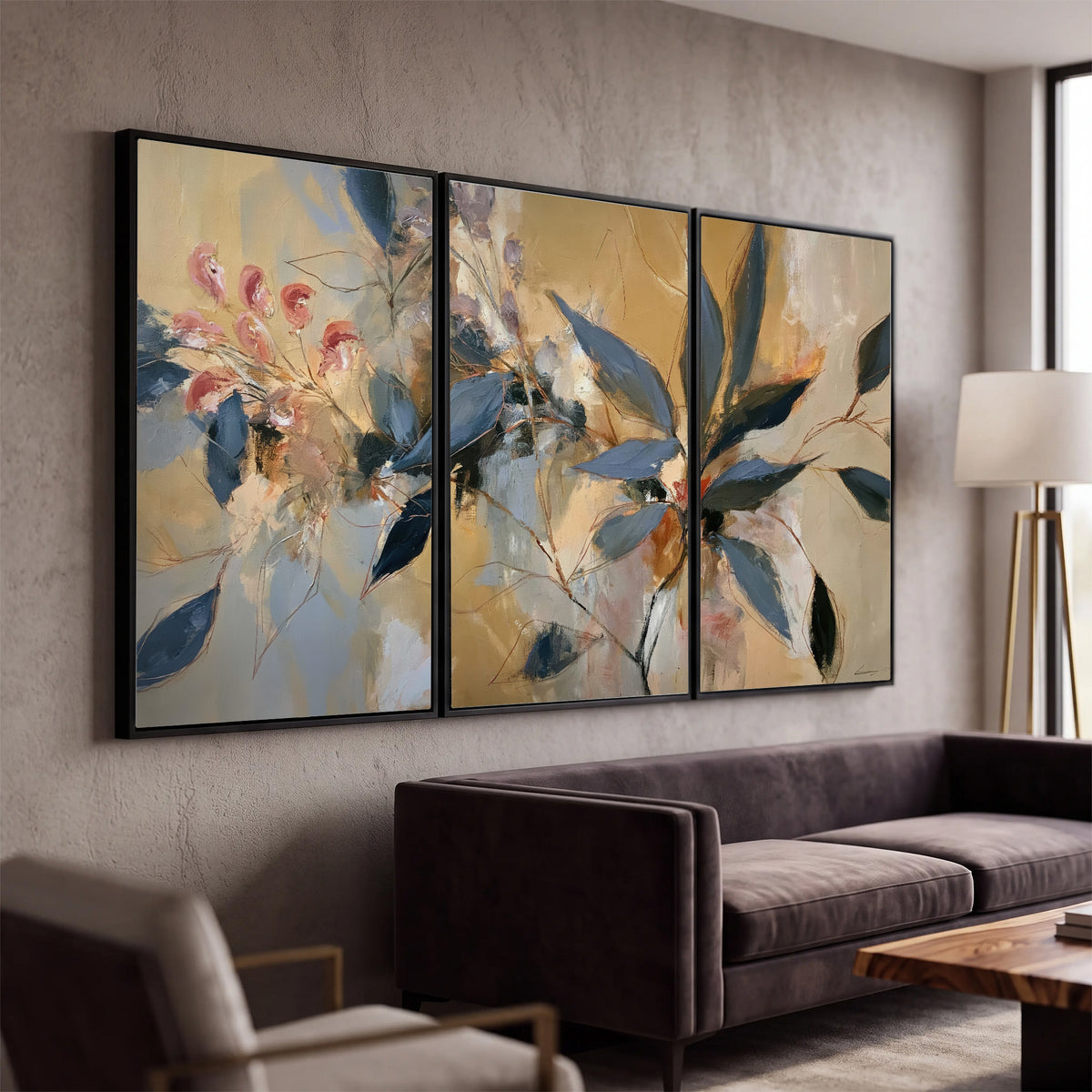 Layered navy leaves and muted pink blossoms against a golden cream background 3 piece framed canvas wall art displayed in a modern living room