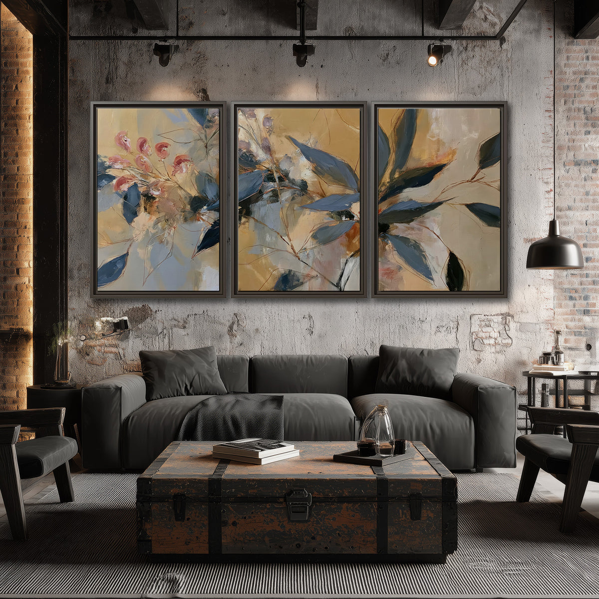 Layered navy leaves and muted pink blossoms against a golden cream background 3 piece framed canvas wall art displayed in a industrial room
