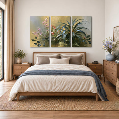 Arching green leaves beside delicate pink garden flowers in soft warm light 3 piece canvas wall art styled in an interior