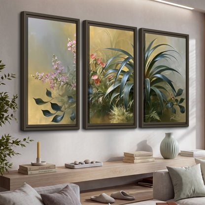 Arching green leaves beside delicate pink garden flowers in soft warm light 3 piece framed canvas wall art displayed in a console