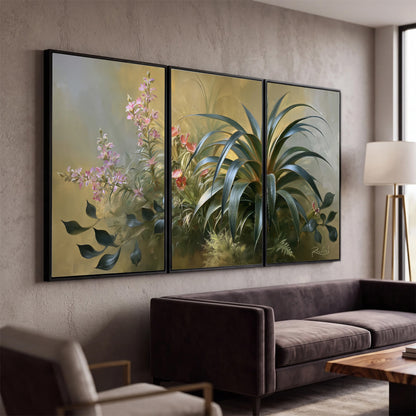 Arching green leaves beside delicate pink garden flowers in soft warm light 3 piece framed canvas wall art displayed in a modern living room