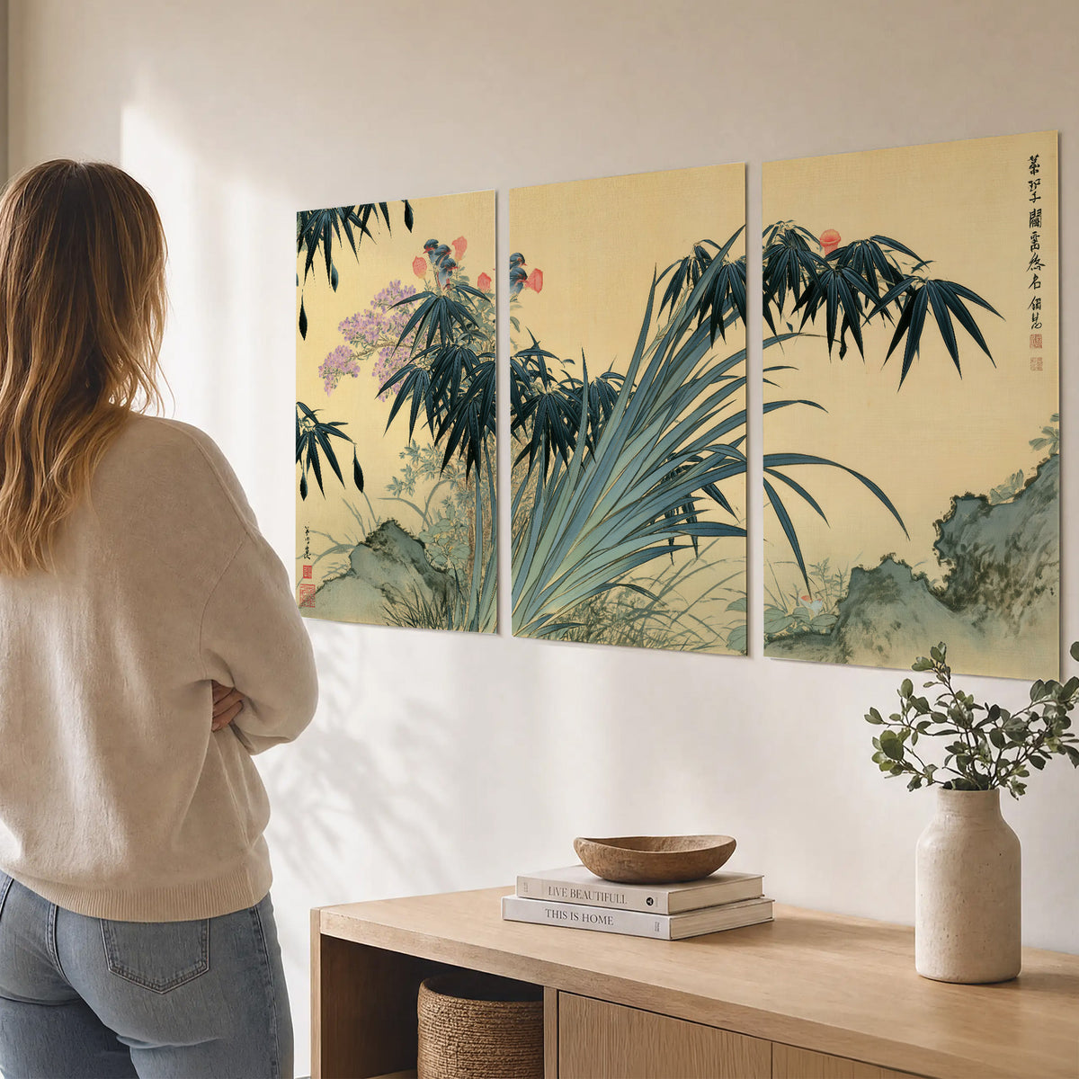 Graceful bamboo leaves and small blossoms on a warm parchment-toned background set of 3 poster prints three panel arrangement on a wall