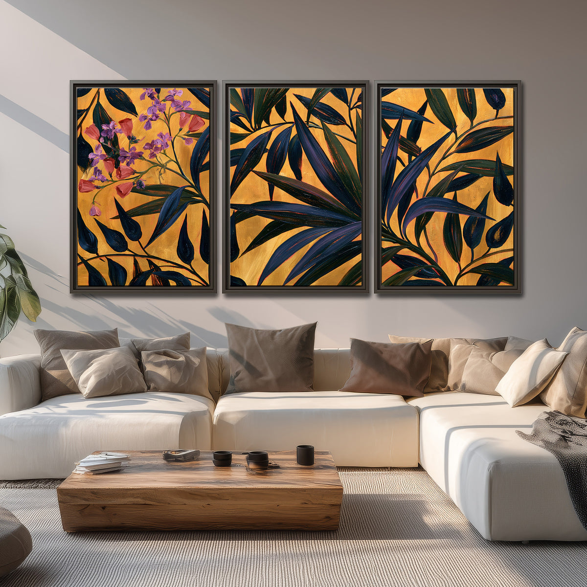 Dark pointed bamboo leaves across an ochre background with small pink floral accents 3 piece framed canvas wall art displayed in a living room
