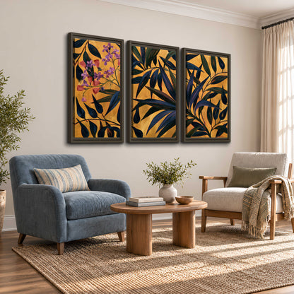 Dark pointed bamboo leaves across an ochre background with small pink floral accents 3 piece framed canvas wall art styled in an interior