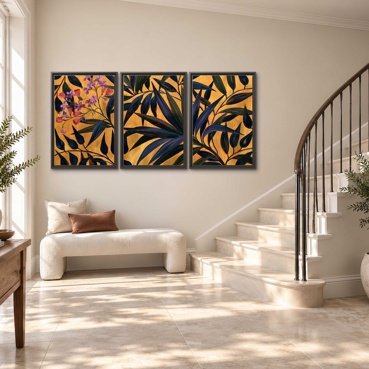 Dark pointed bamboo leaves across an ochre background with small pink floral accents 3 piece framed canvas wall art styled in an interior