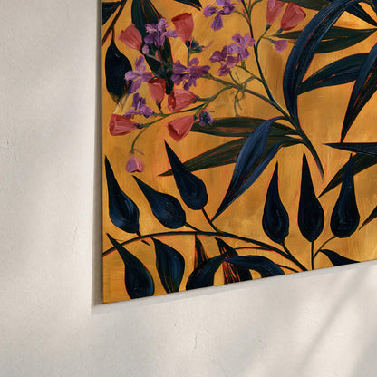 Dark pointed bamboo leaves across an ochre background with small pink floral accents set of 3 poster prints material and edge close up