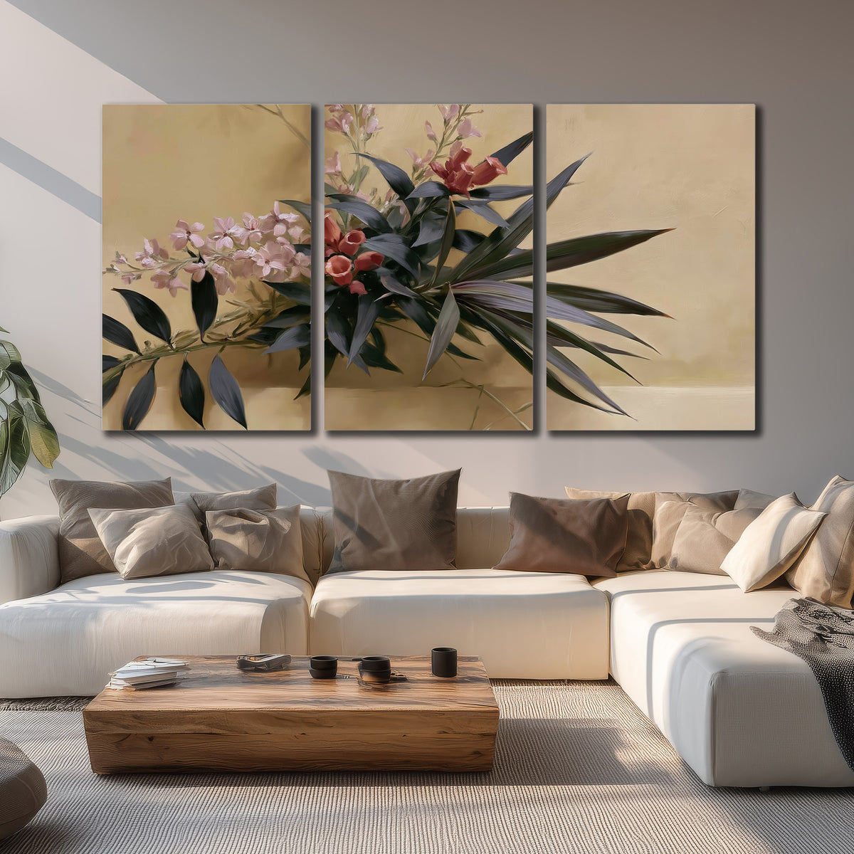Long dark leaves and dusty pink flowers arranged against a soft beige background 3 piece canvas wall art displayed in a living room