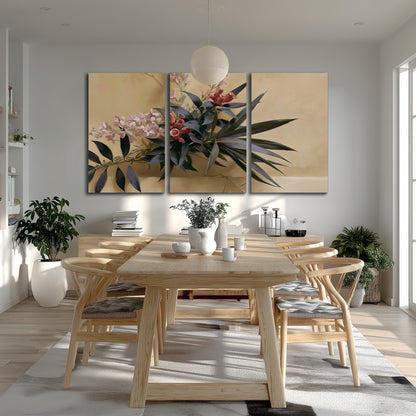 Long dark leaves and dusty pink flowers arranged against a soft beige background 3 piece canvas wall art room and product view