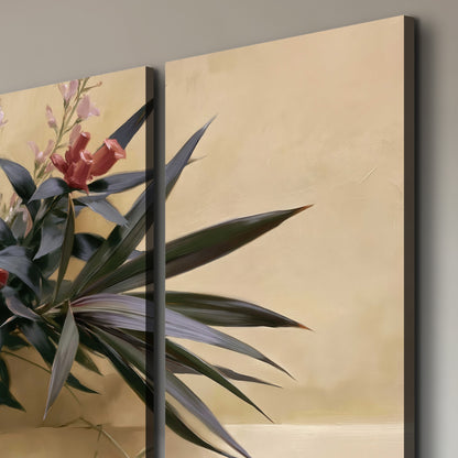 Long dark leaves and dusty pink flowers arranged against a soft beige background 3 piece canvas wall art room and product view