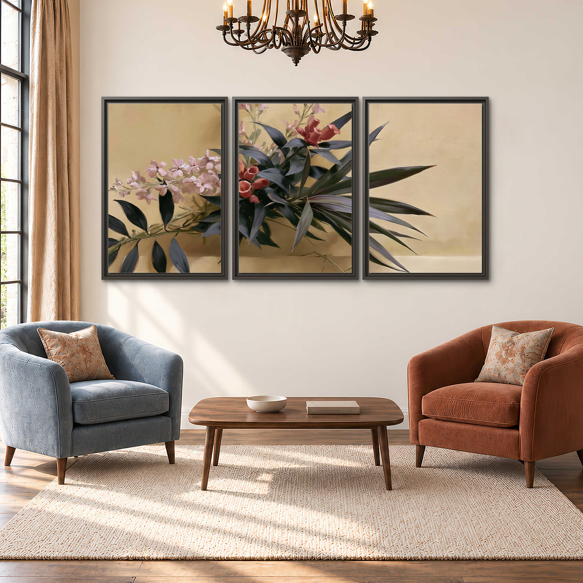 Long dark leaves and dusty pink flowers arranged against a soft beige background 3 piece framed canvas wall art styled in an interior