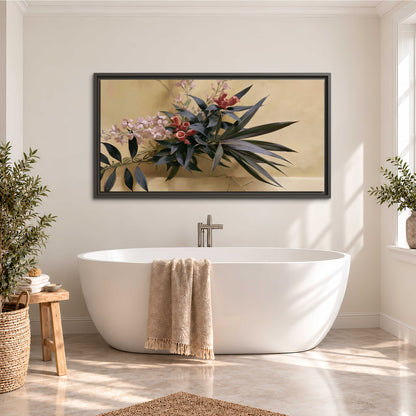 Long dark leaves and dusty pink flowers arranged against a soft beige background single framed canvas wall art styled in an interior