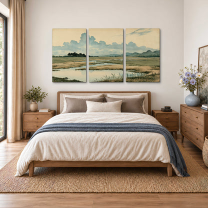 A calm marshland with reflective pools and distant blue-green hills under a clouded sky 3 piece canvas wall art styled in an interior