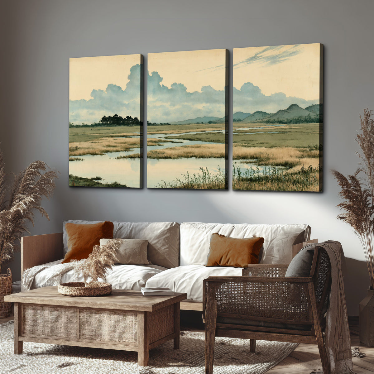 A calm marshland with reflective pools and distant blue-green hills under a clouded sky 3 piece canvas wall art displayed in a rustic living room