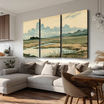 A calm marshland with reflective pools and distant blue-green hills under a clouded sky 3 piece canvas wall art room and product view