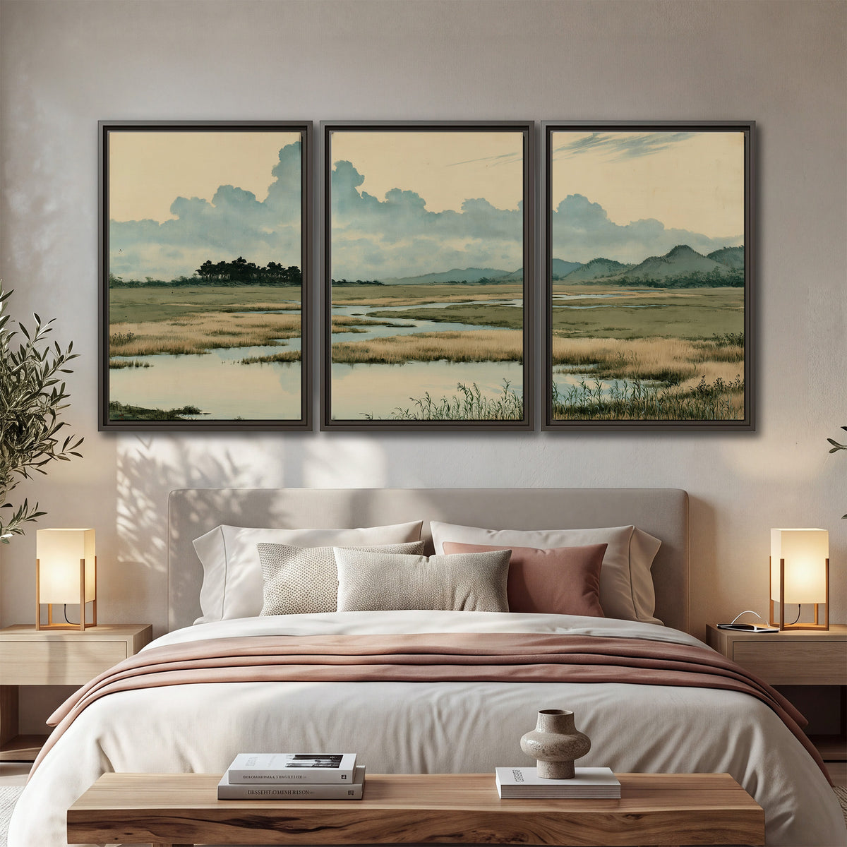 A calm marshland with reflective pools and distant blue-green hills under a clouded sky 3 piece framed canvas wall art displayed in a bedroom