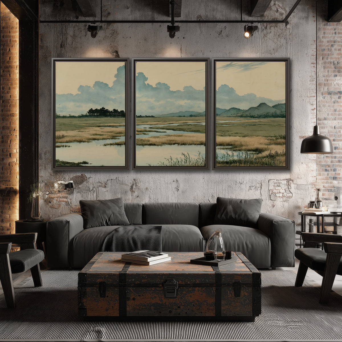 A calm marshland with reflective pools and distant blue-green hills under a clouded sky 3 piece framed canvas wall art displayed in a industrial room