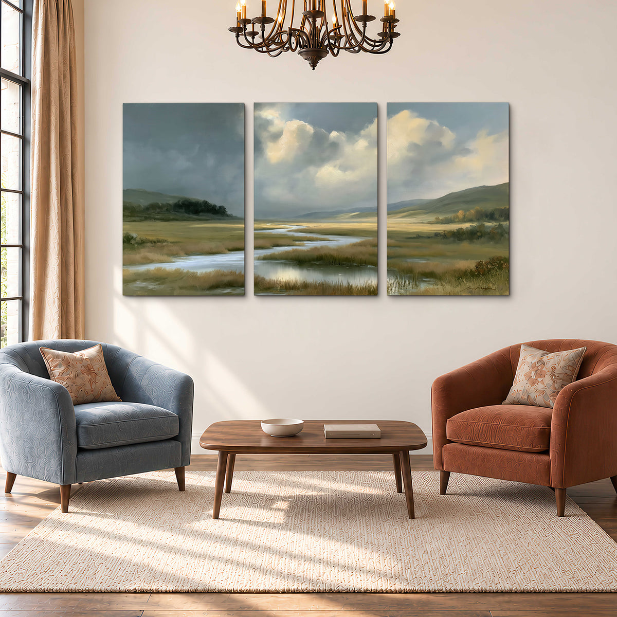 A winding stream through an open meadow beneath large sunlit clouds 3 piece canvas wall art styled in an interior